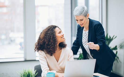 Colleagues business woman working together in the office