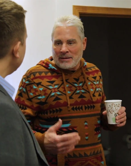 Man being interviewed for American Pavement